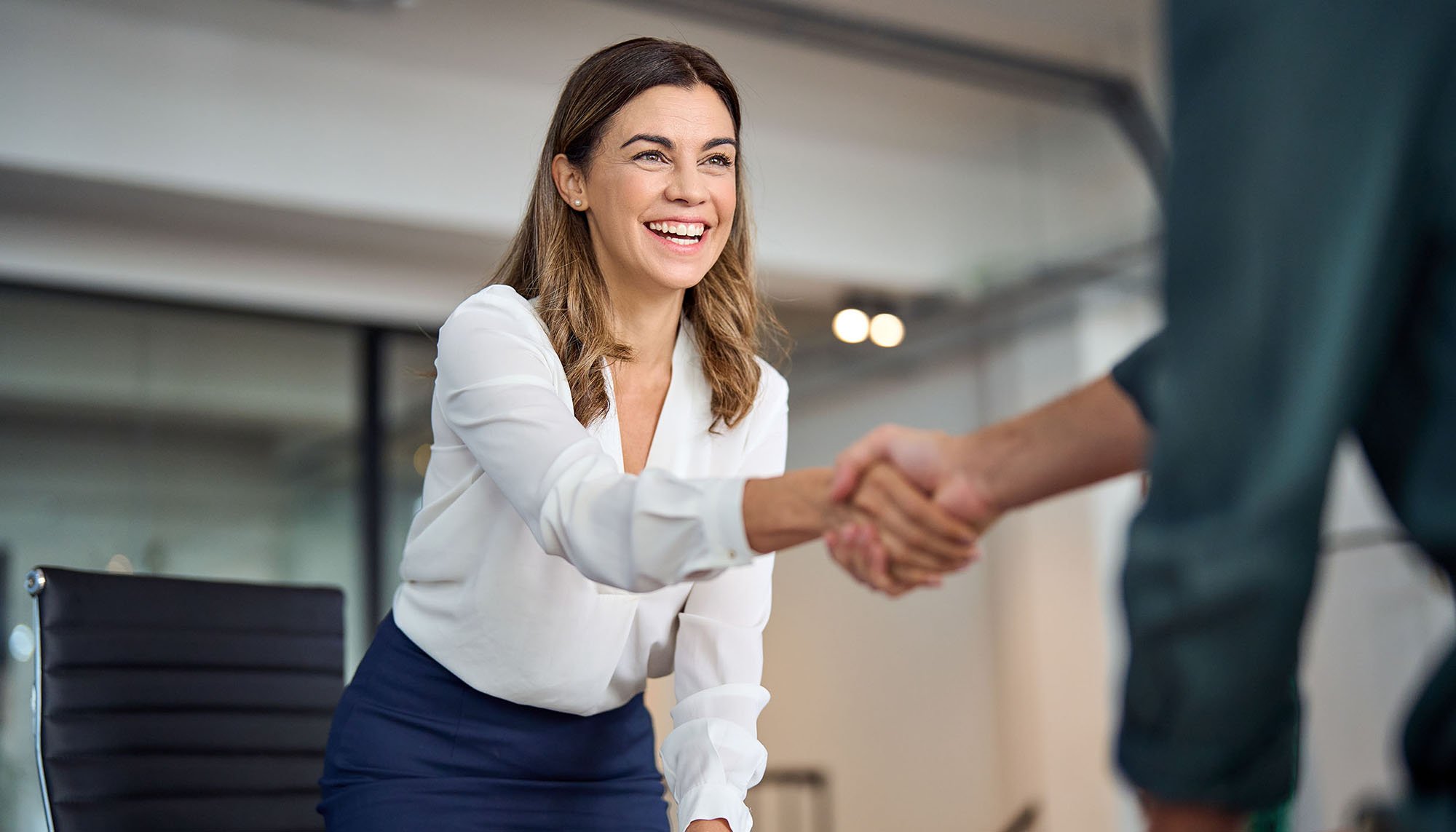 business woman shaking hands