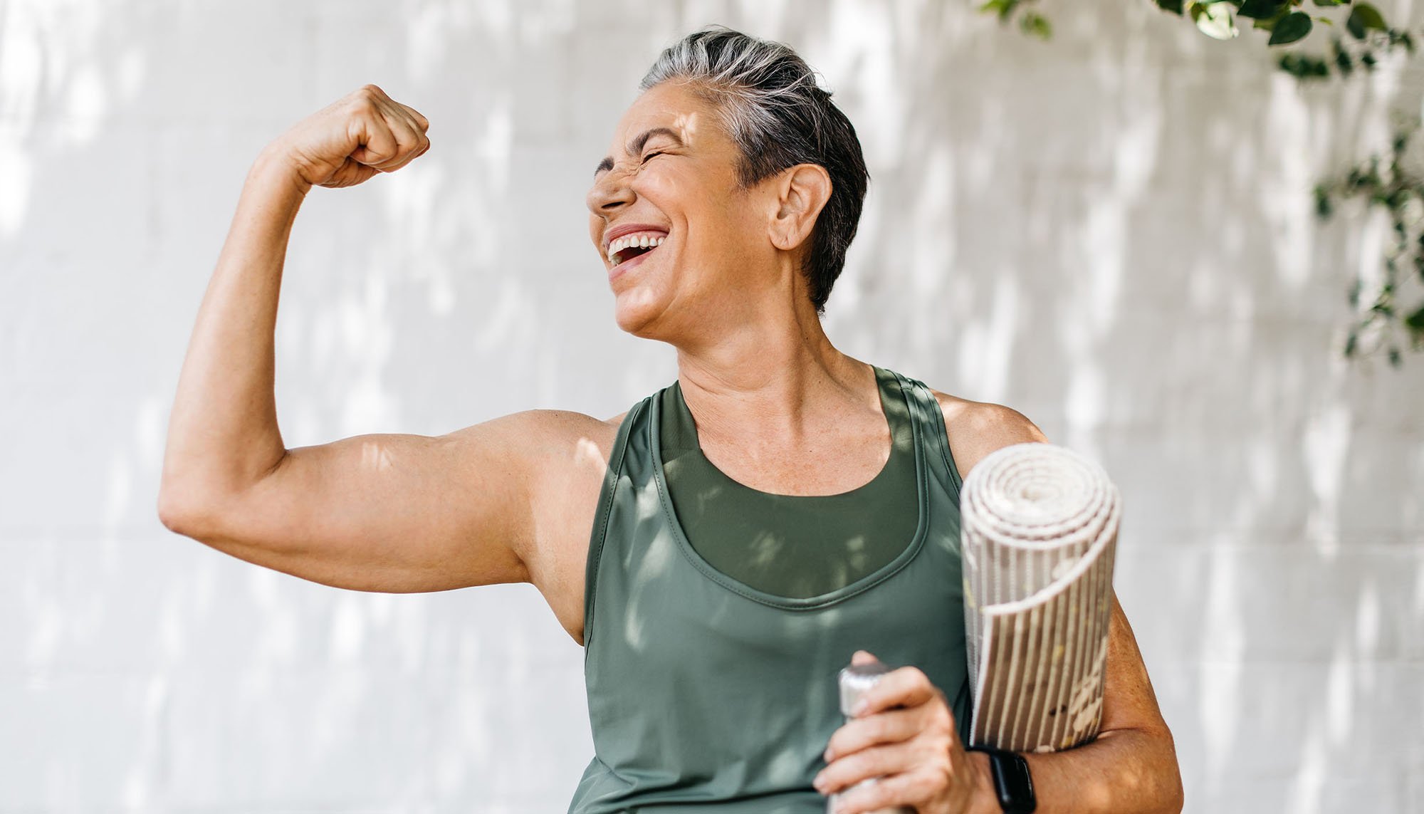woman flexing bicep