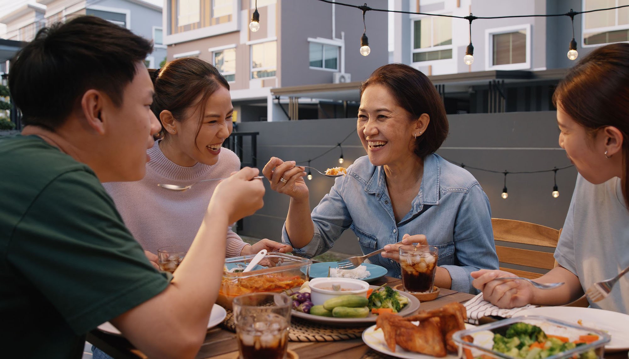 asian family having dinner outside