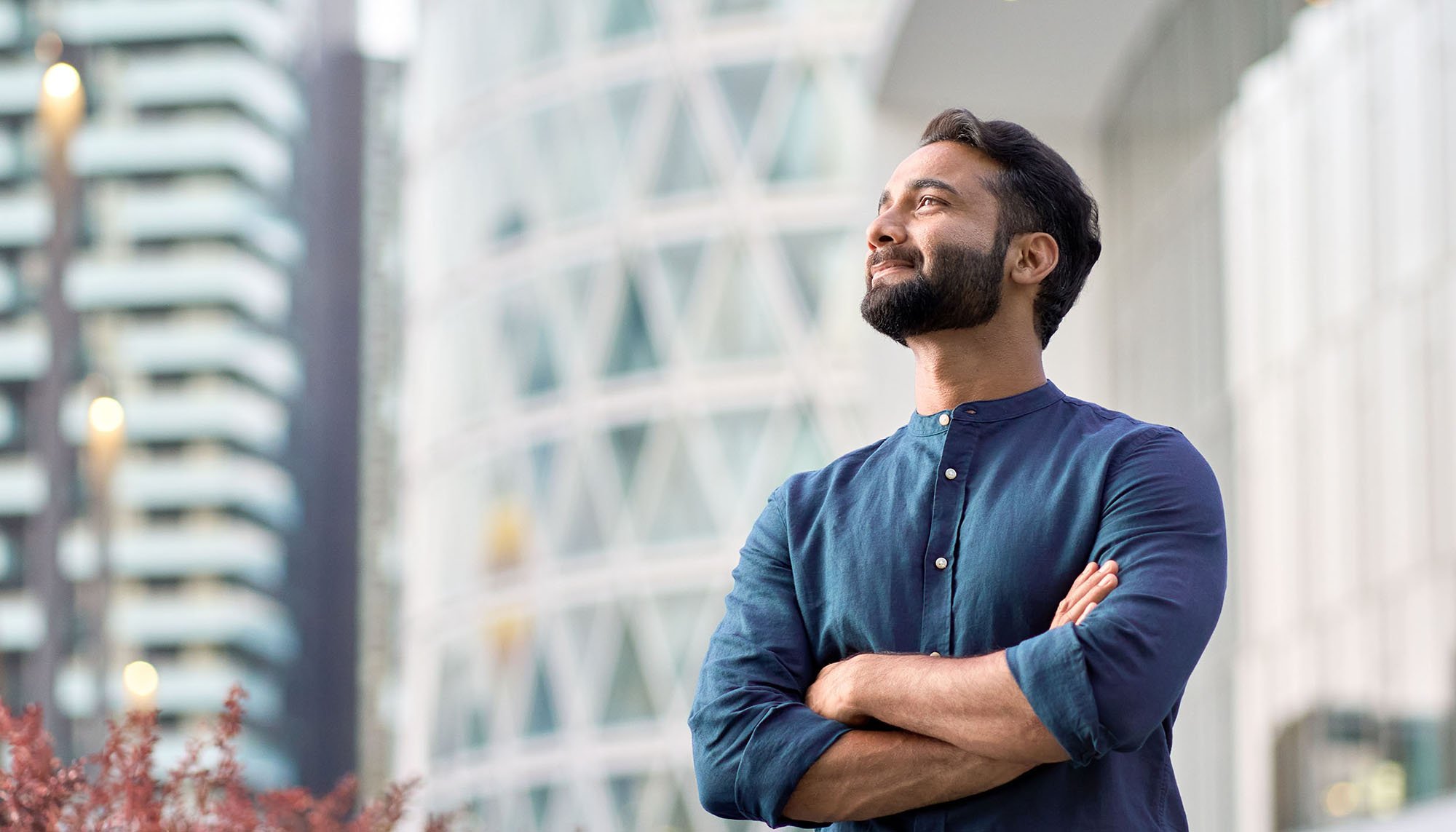 man outside feeling happy