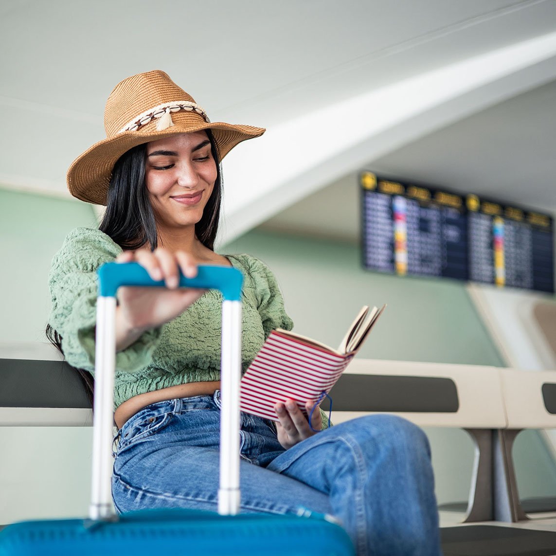woman travelor reading book